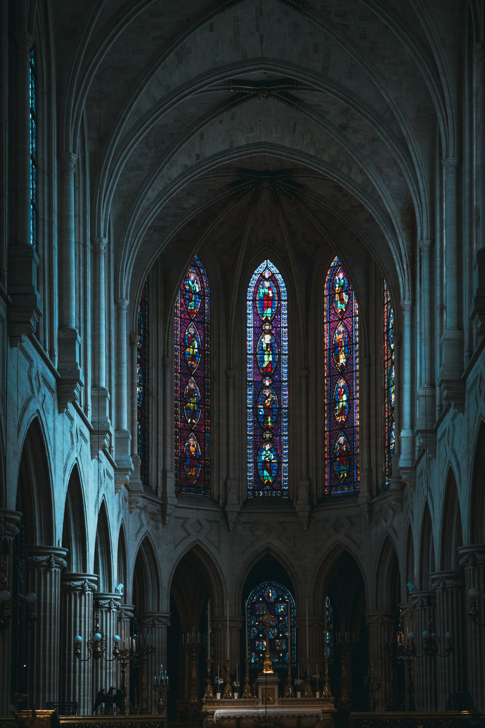 Gothic cathedral interior with stained glass